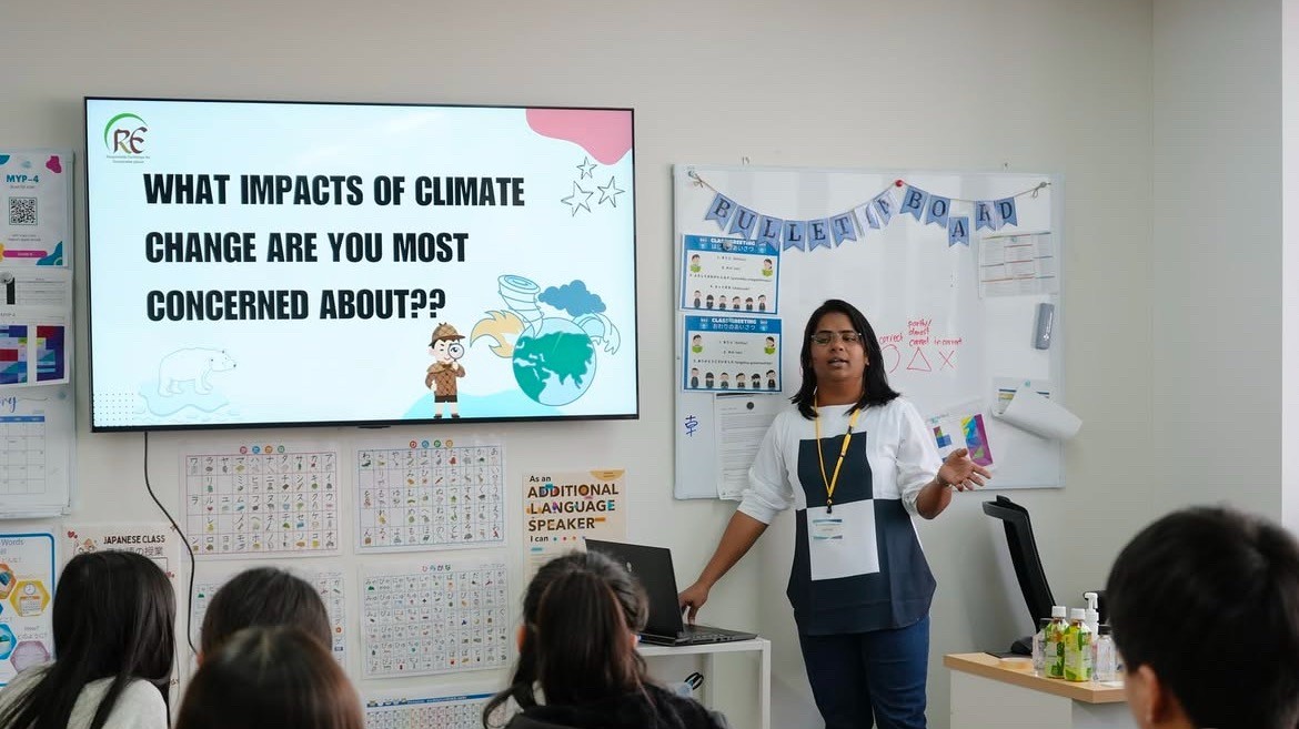 Participants exploring climate policy scenarios with the EN-ROADS simulator